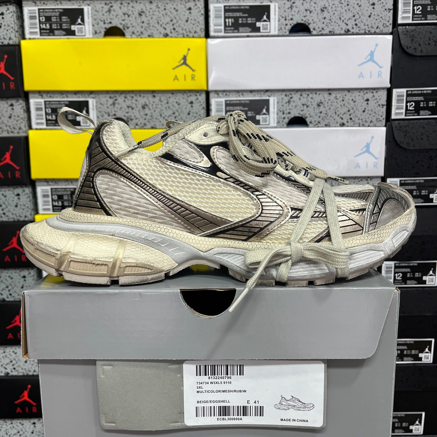 Balenciaga unisex sneaker side view, light gray mesh, chunky sole, lace-up