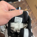 Balenciaga sneaker size label inside collar; black knit lining with E.U.R. size text