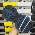 Balenciaga unisex sneakers outsole in dark gray with blue traction tread and white lace strap