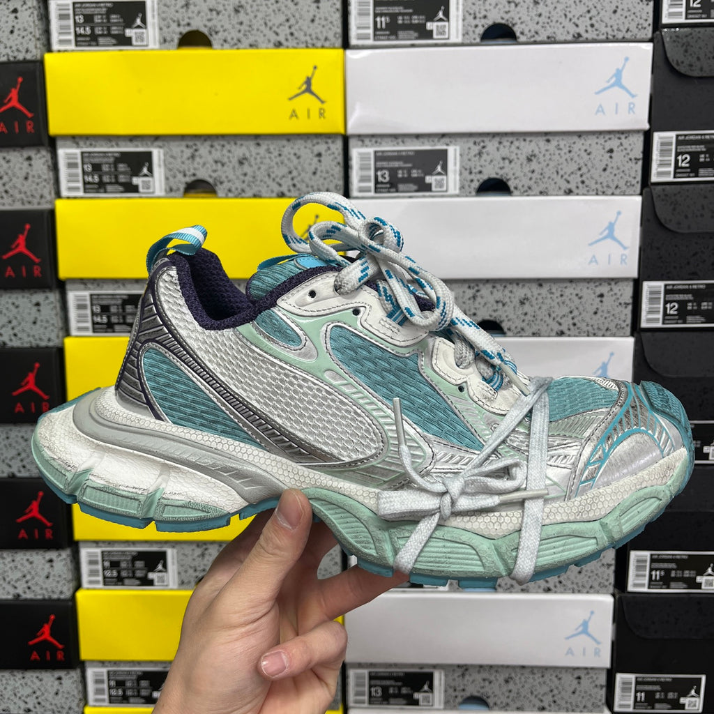 Balenciaga unisex sneaker in white, teal, and silver with blue lace trim and chunky sole
