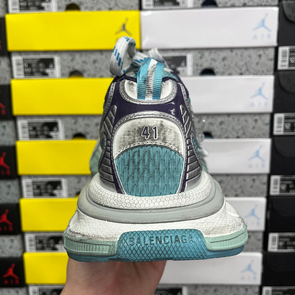 Balenciaga unisex sneaker heel with embossed “41” and “BALENCIAGA” text on teal sole