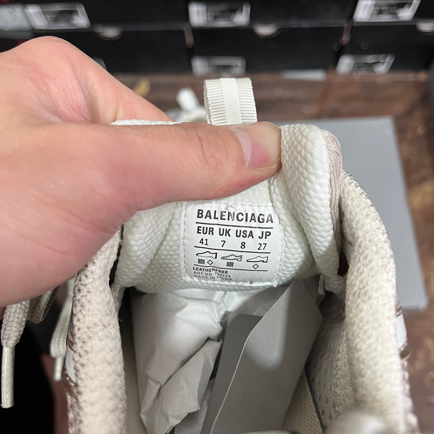 Silver-gray sneaker size label with BALENCIAGA and EU UK US size details.