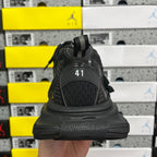 Black Balenciaga sneaker rear view with “41” size mark on heel