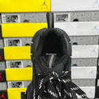Black Balenciaga sneaker heel with woven pull tab and “BALENCIAGA” text