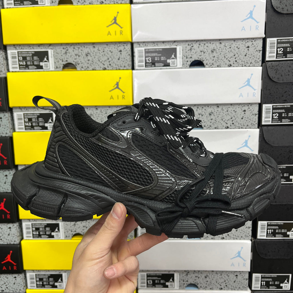 Black Balenciaga unisex sneakers with lace-up front and textured panels