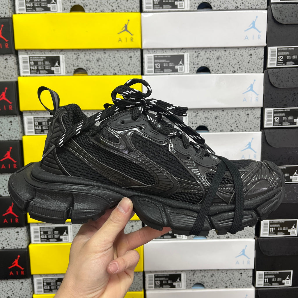 Black Balenciaga unisex sneakers, lace-up front with chunky midsole