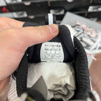 Sneaker interior with BALENCIAGA size label on black collar lining