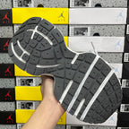 Sneaker outsole with deep tread pattern, grey rubber and white side stripe