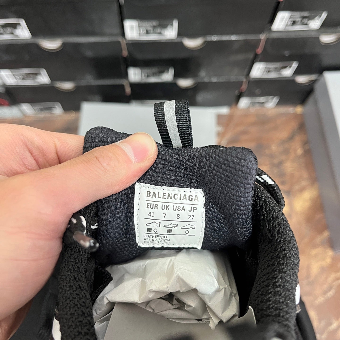 Balenciaga size label inside black sneaker: EU UK USA JP 41 7 8 27