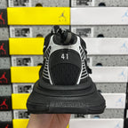Black sneaker heel with size mark '41' and thick cushioned rubber sole