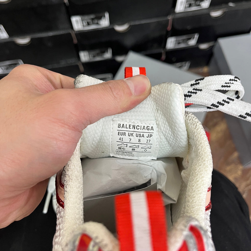 Balenciaga unisex sneaker size label inside collar with red-and-white branding