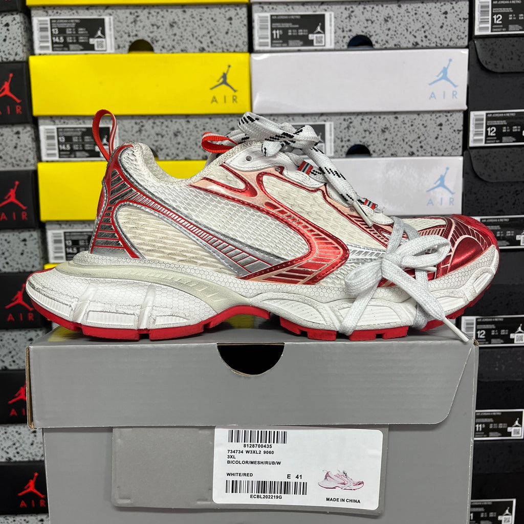 Balenciaga unisex sneaker side view in white and red with white lace-up design