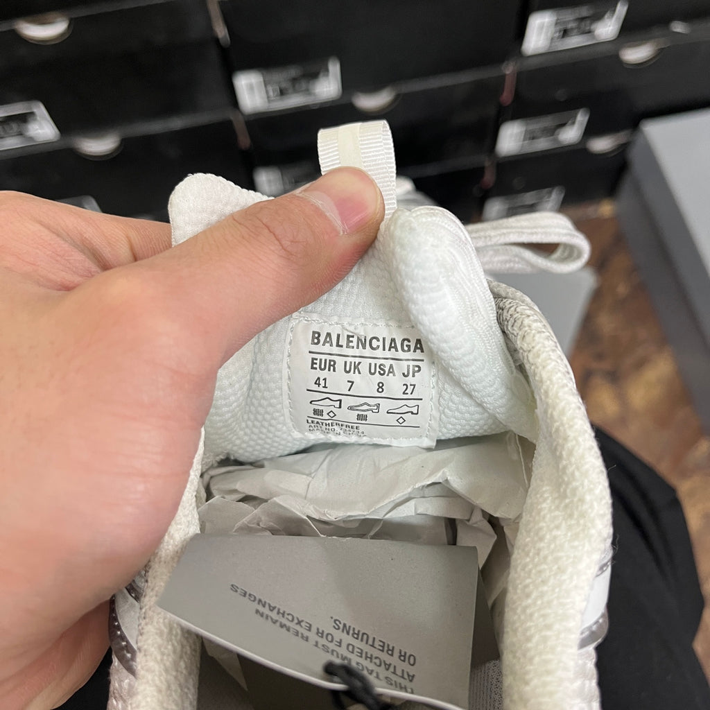 Balenciaga sneaker size tag inside, with EUR/UK/USA sizes and care label