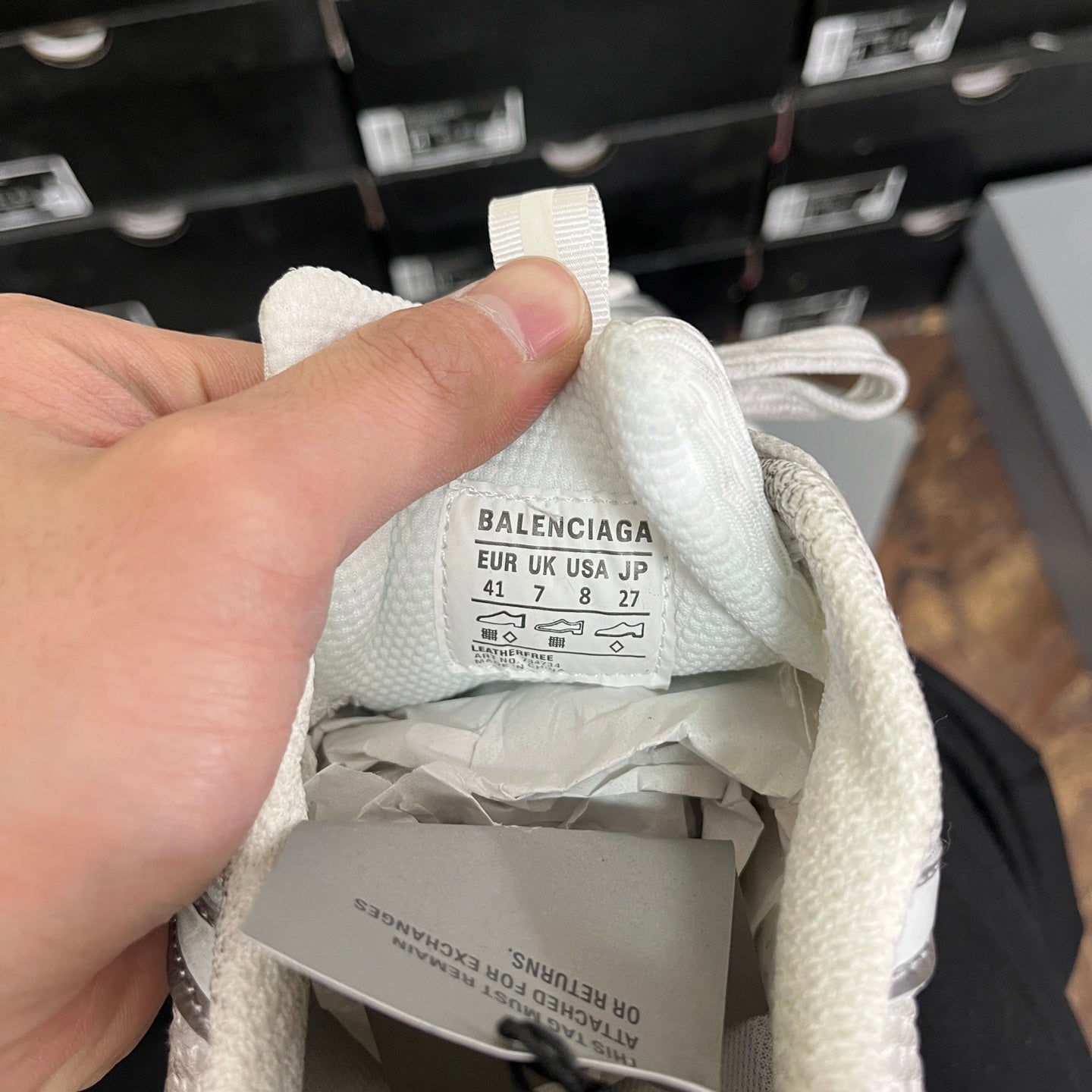 Balenciaga sneaker size tag inside, with EUR/UK/USA sizes and care label
