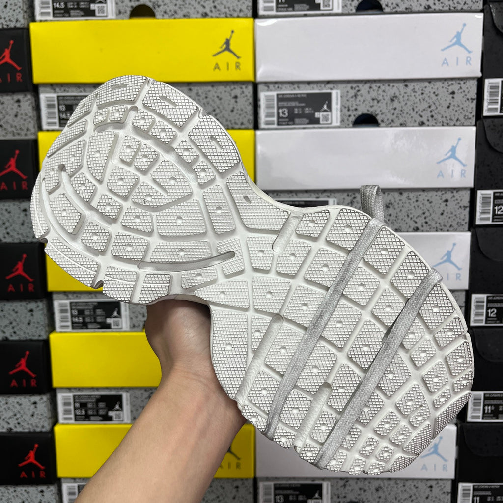 Unisex Balenciaga sneaker outsole, white rubber tread with grid-like traction pattern