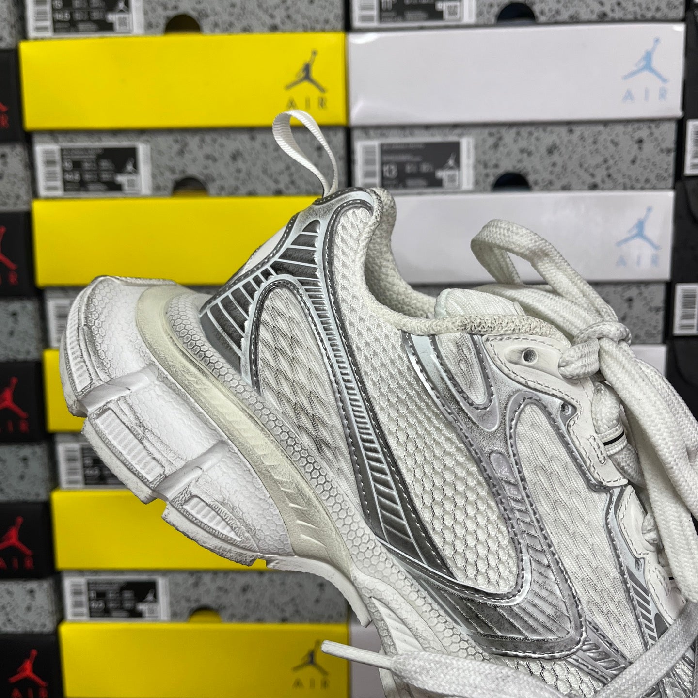 Unisex Balenciaga sneakers, silver/white with textured heel panel and lace-up closure