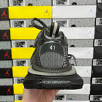 Unisex running sneaker heel view with gray knit lining and textured midsole