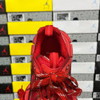 Red sneaker interior view showing padded collar and lace ties