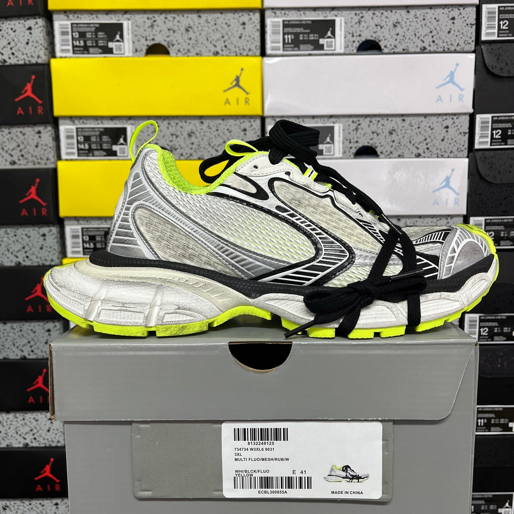 Silver, black and neon green running sneakers, lace-up side view