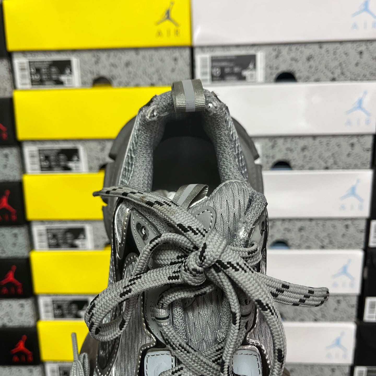 Unisex gray sneaker collar open view with laces and fabric lining