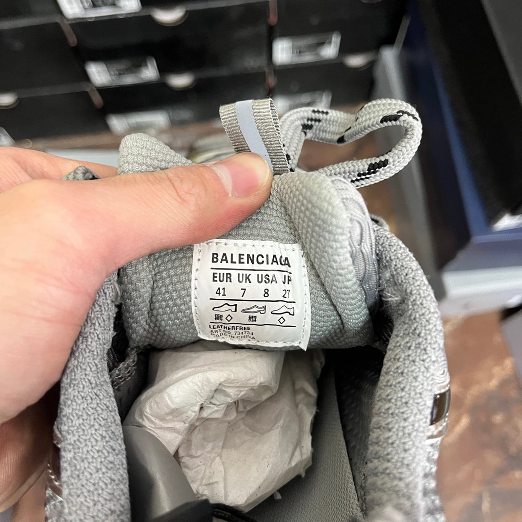 Unisex gray sneaker size tag showing Balenciaga and EU/UK size 41