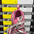 Pink sneaker collar interior with gray laces and pink pull loop detail