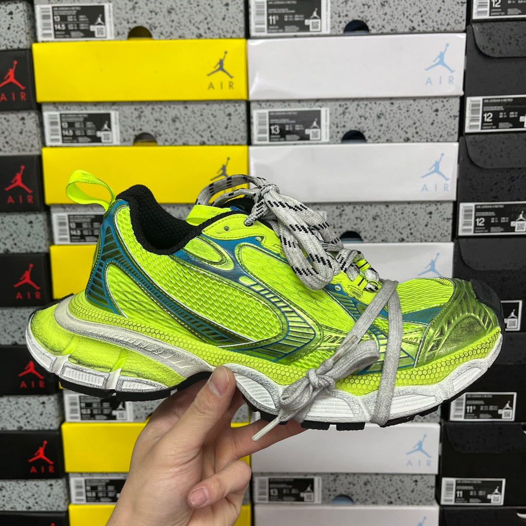 Neon green and blue unisex running shoes with gray lace-up and chunky white sole