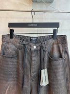 Balenciaga denim pants with drawstring waistband and front button closure