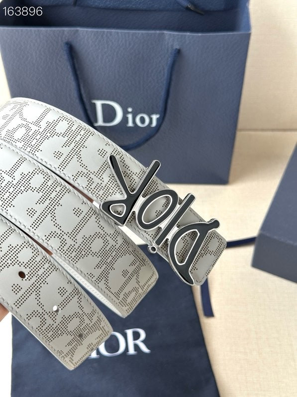 Dior belt detail view, light gray perforated-look logo strap with buckle
