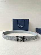 Dior belt in light gray with repeating logo pattern and black-and-gold buckle