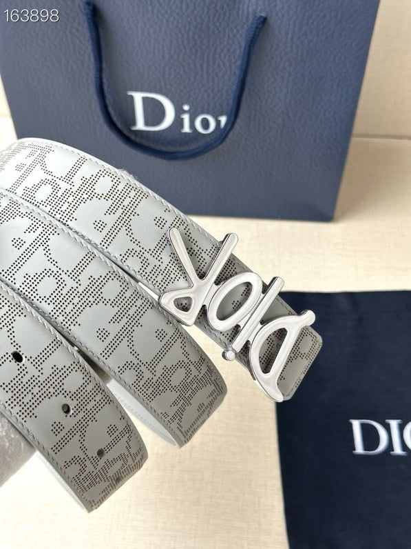 Dior belt close-up: light gray monogram strap with silver-tone Dior buckle