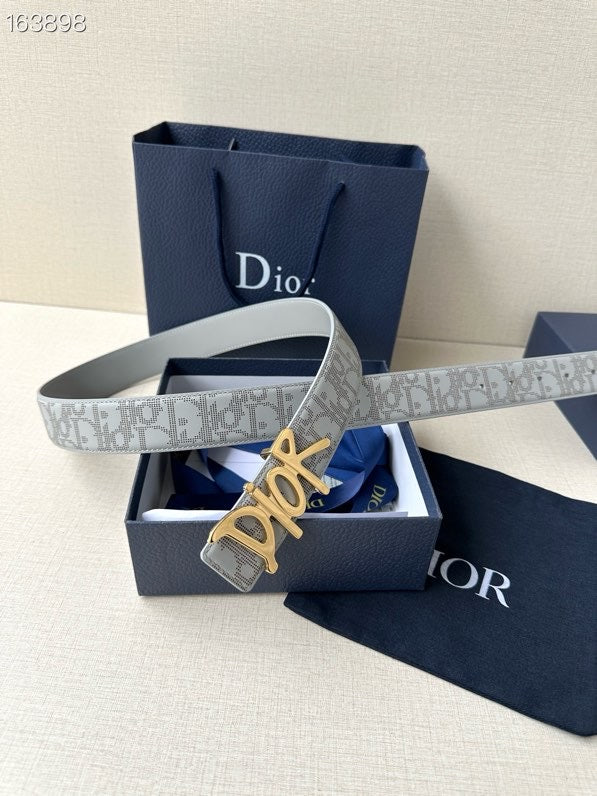 Dior belt on gift box: light gray monogram strap with gold-tone Dior buckle
