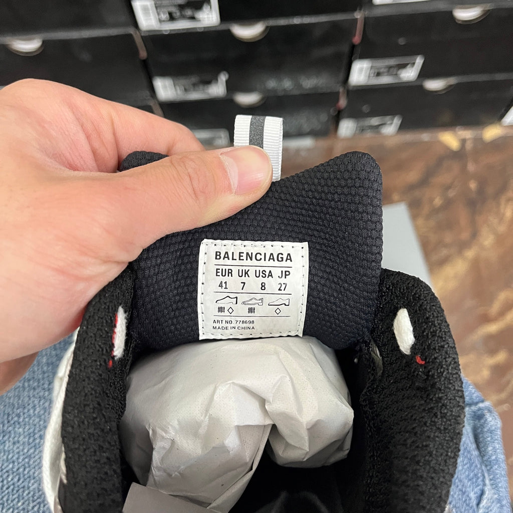 Balenciaga unisex sneakers size label inside, white tag on black mesh tongue