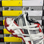 Balenciaga unisex sneakers lateral view, black collar with white laces and red sole