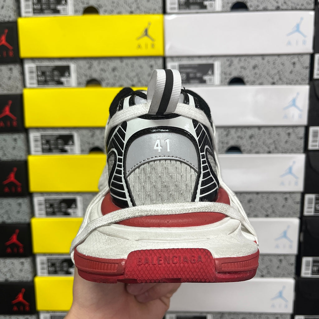 Balenciaga unisex sneakers heel back view, gray tread with red midsole section
