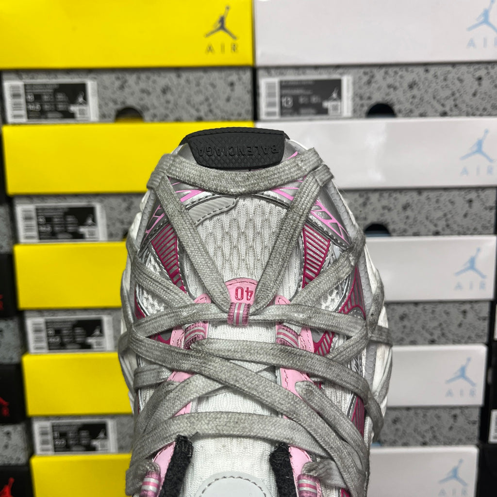 Light gray sneaker heel and tongue with pink striped trim