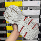White rubber sneaker outsole with grid tread and red side stripes