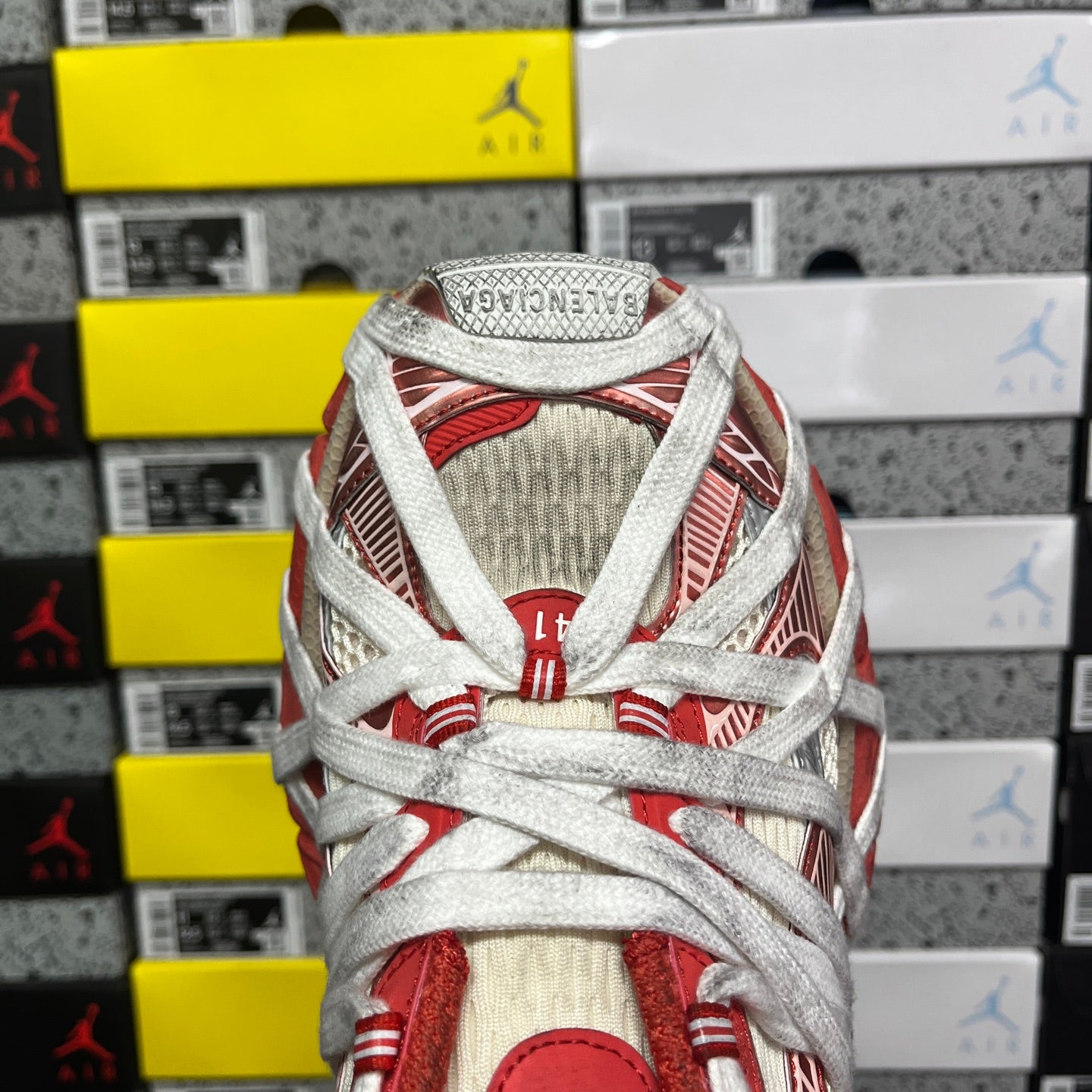Balenciaga sneaker tongue and laces, red collar and white textured quarter panel