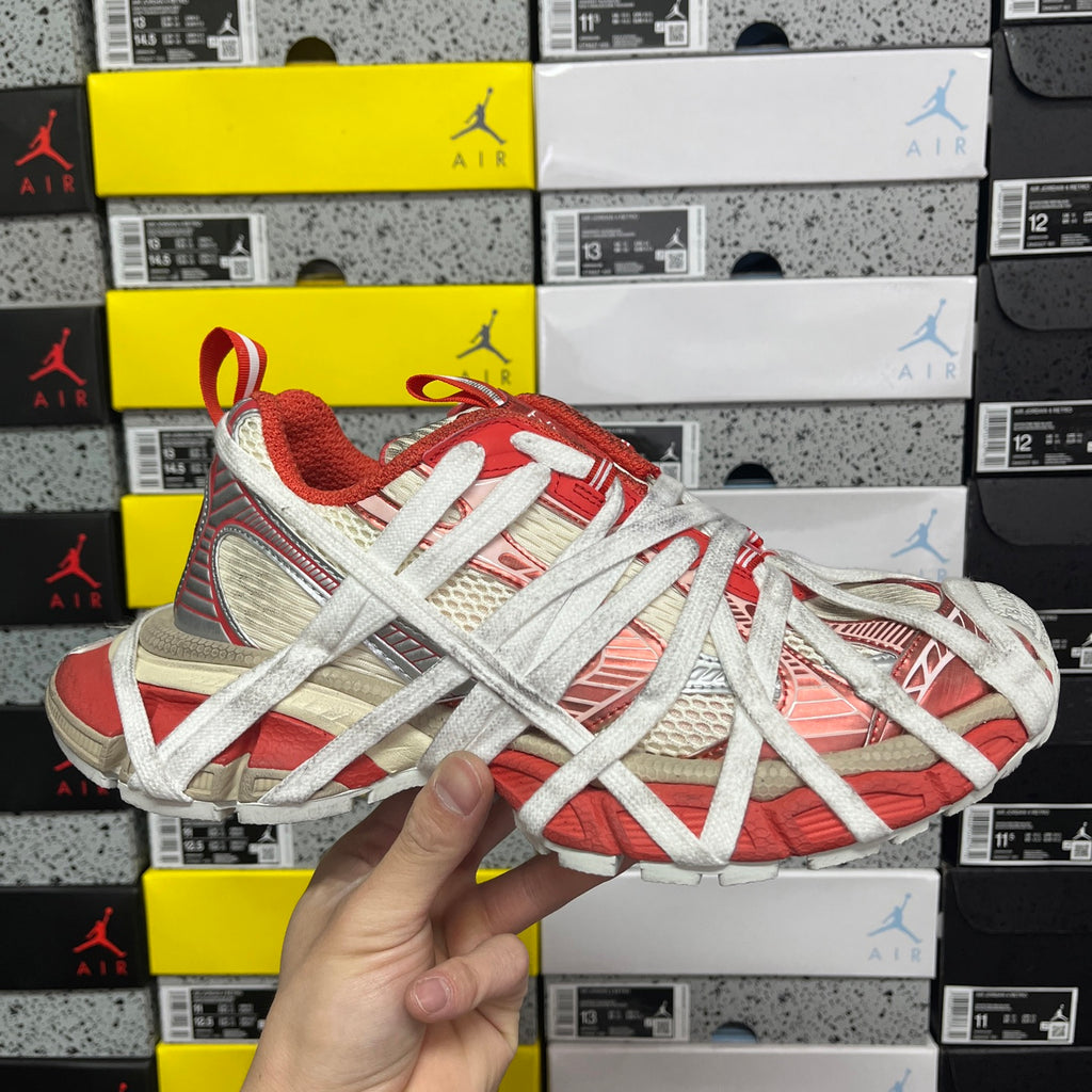 Unisex red and white Balenciaga sneaker with silver laces and textured panels