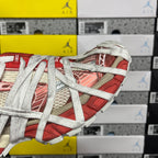 Balenciaga sneaker with red lining and white laces over mesh and trim details