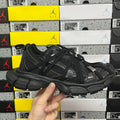 Balenciaga unisex black athletic shoes with mesh upper and lace-up front