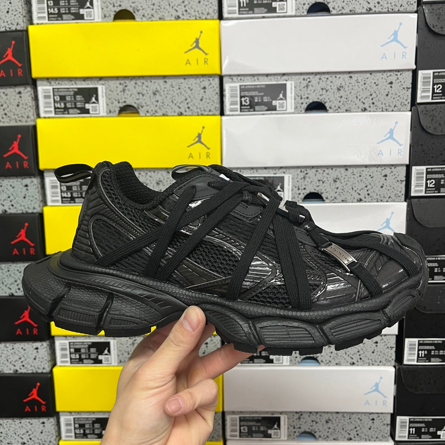 Balenciaga unisex black athletic shoes with mesh upper and lace-up front