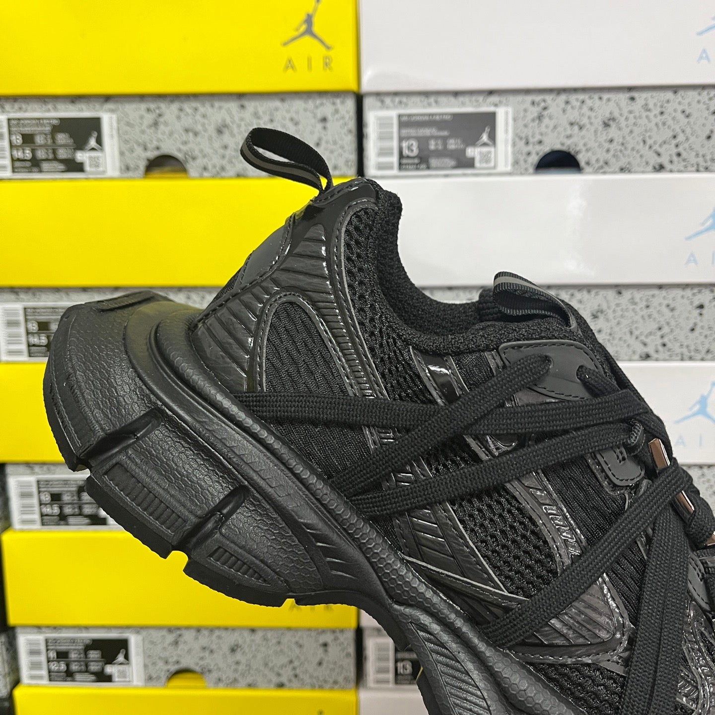 Balenciaga unisex black athletic shoes, textured side panel and padded toe