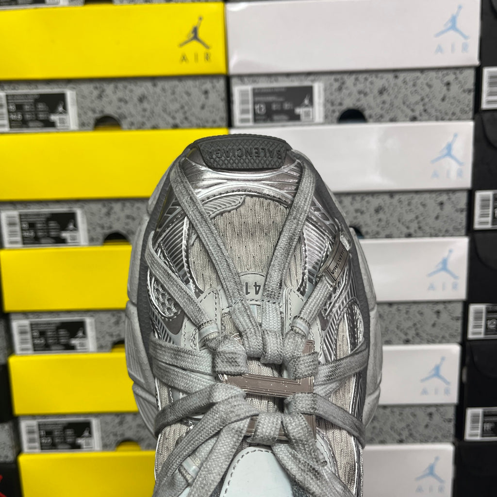 Gray lace-up sneaker upper with woven texture and padded collar