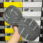 Gray rubber outsole with traction tread and molded pattern