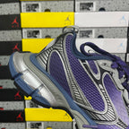 Sneakers heel and side in silver and purple with purple laces and mesh panel