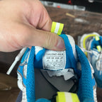 Unisex sneaker tongue label reading BALENCIAGA, with size info and blue interior