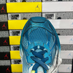 Unisex sneaker toe and laces in textured blue knit with metallic silver overlays