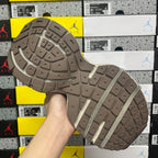 Gray sneaker outsole with traction tread pattern and textured rubber forefoot