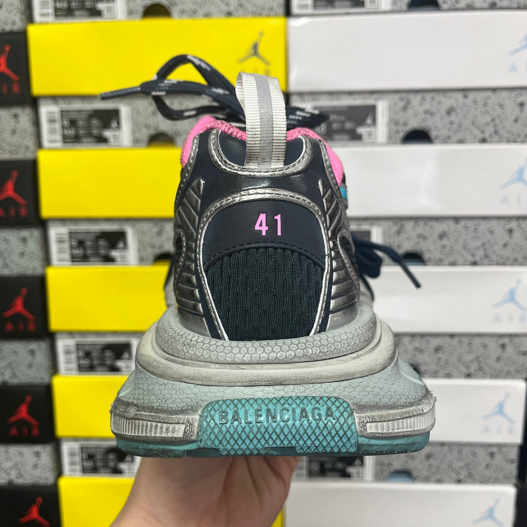 Unisex running shoe heel with BALENCIAGA logo and black upper on light midsole